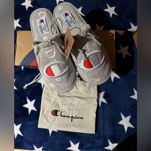 New champion slippers with tags size 10 with bag